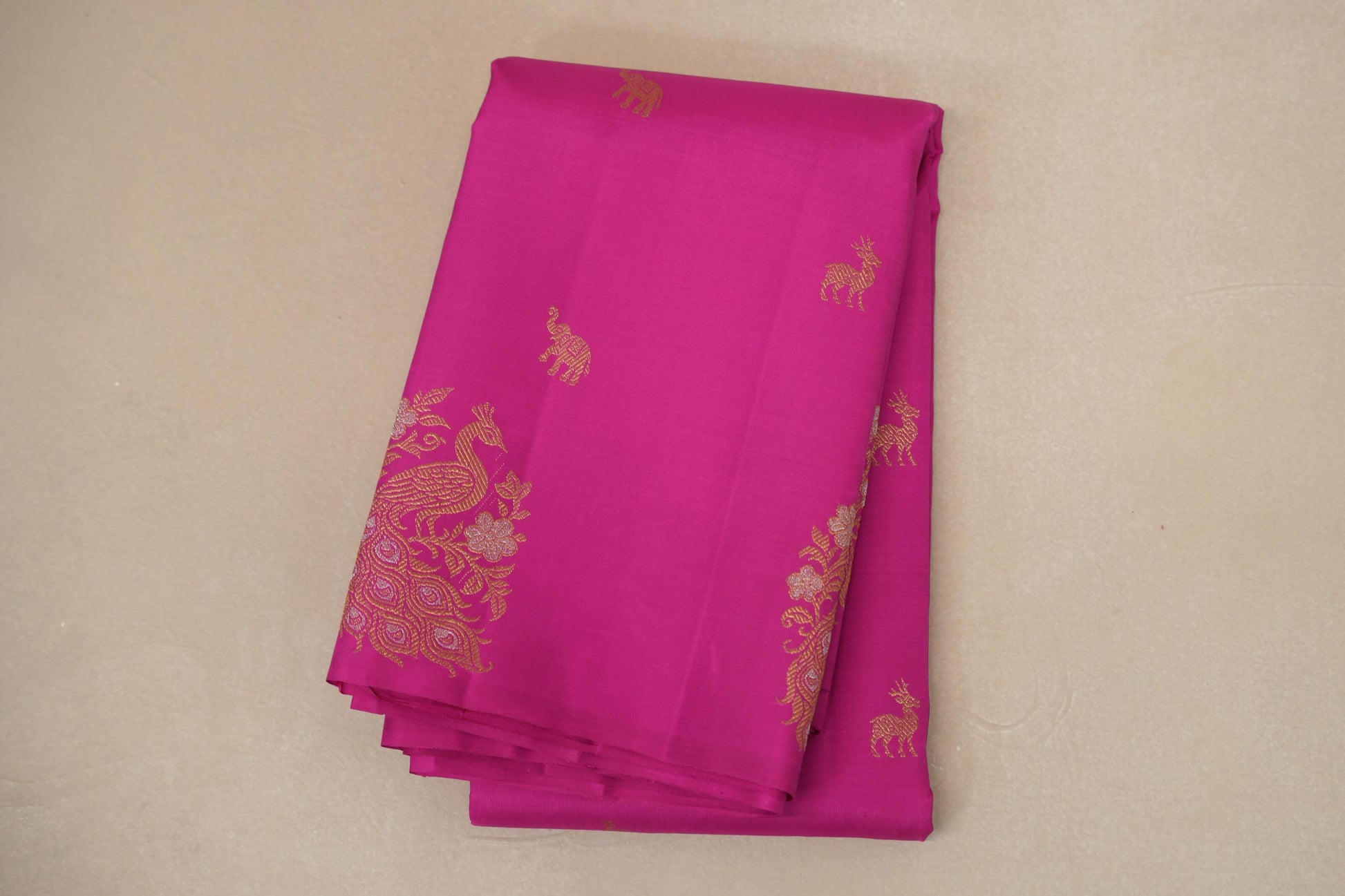 folded Bright Rani Pink Vintage Kanjivaram Silk Saree
