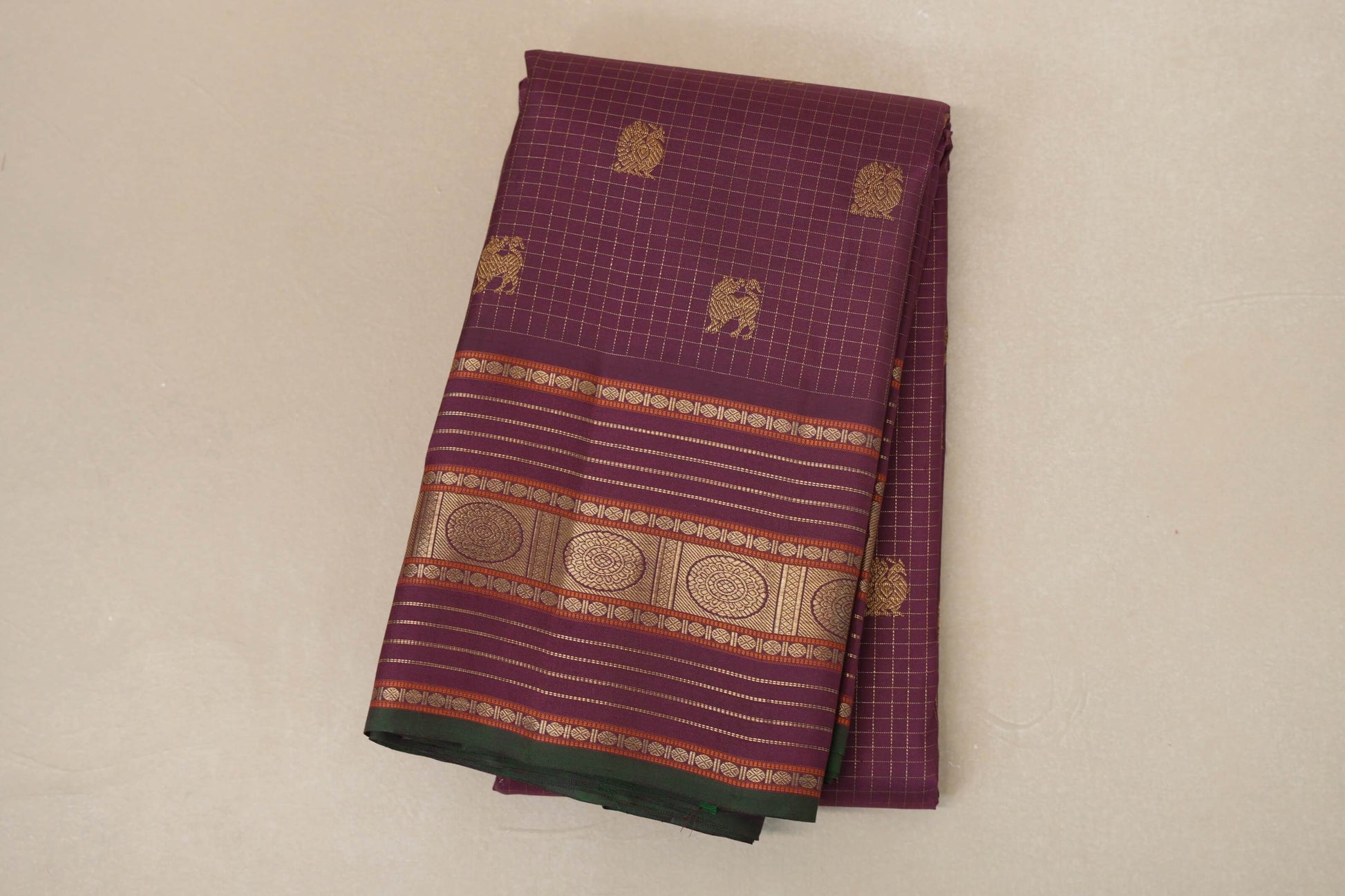 folded Deep Plum with Green Selvedge Heirloom Kanjivaram Silk Saree