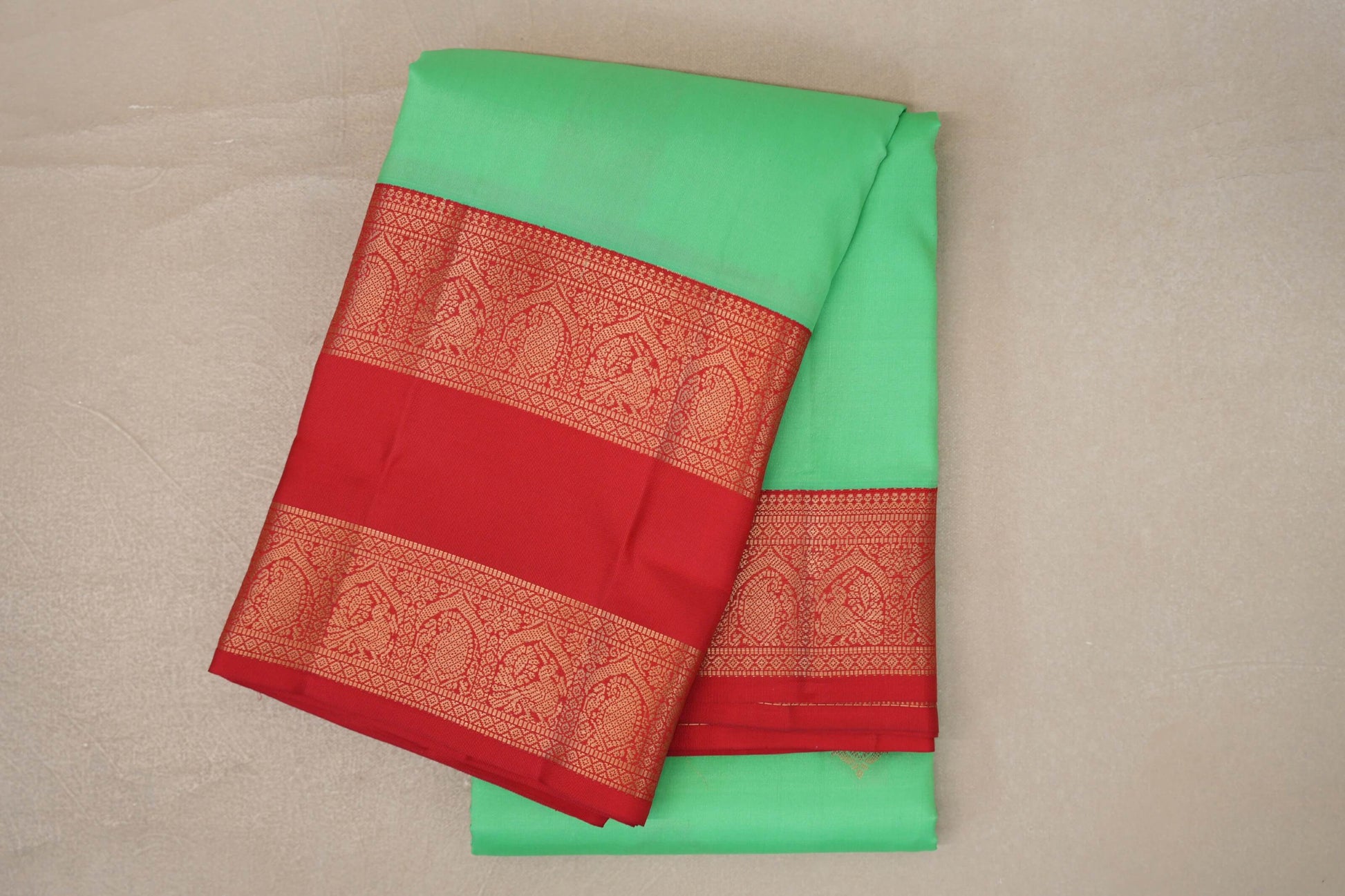 folded Mint Green Soft Silk Saree