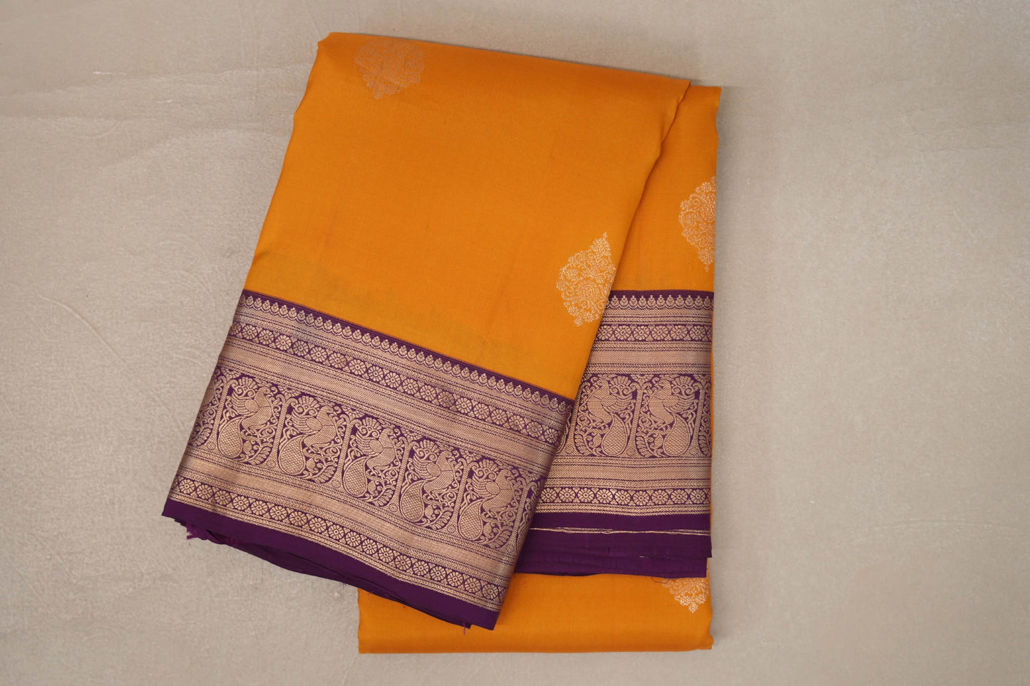 folded Mango Orange Soft Silk Saree