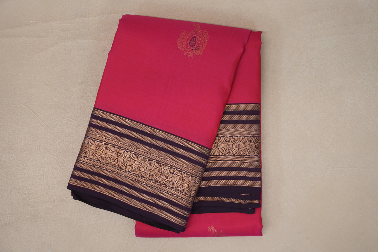 folded Bright Rani Pink Soft Silk Saree 